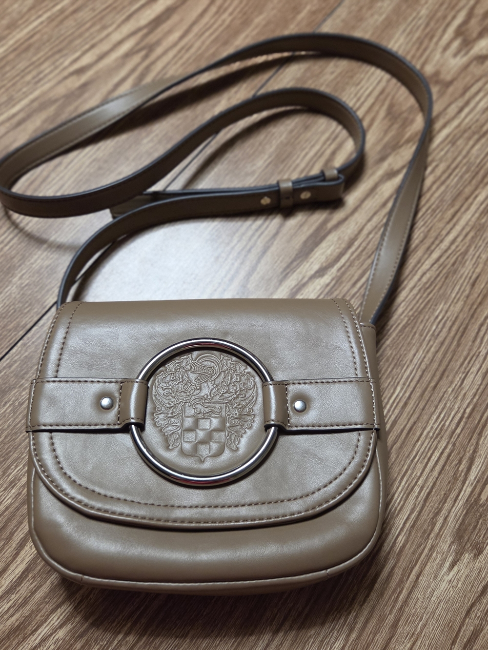 Vince Camuto Taupe Gordi Crossbody with Embossed Crest and Silver Ring